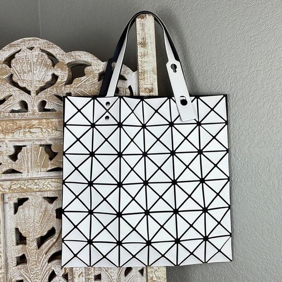 Infrequently used and in almost new state. Issey Miyake